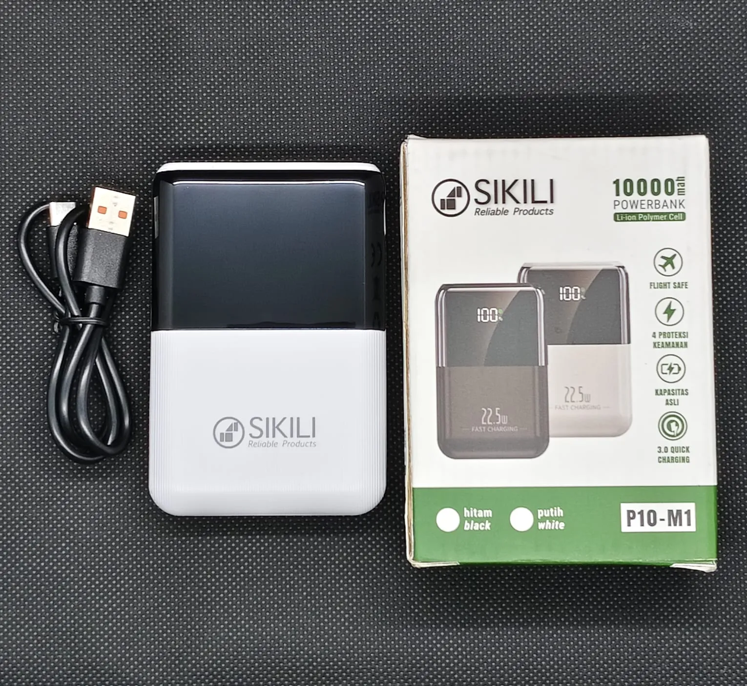 Power bank mini Sikili P10-M1 dengan kabel USB dan kotak kemasan